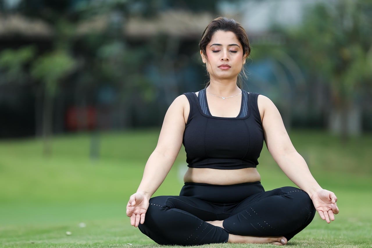 Woman, yoga, meditation — Dr. Felix Shepard Offering Patient-Centered Urology Care with Compassion and Precision