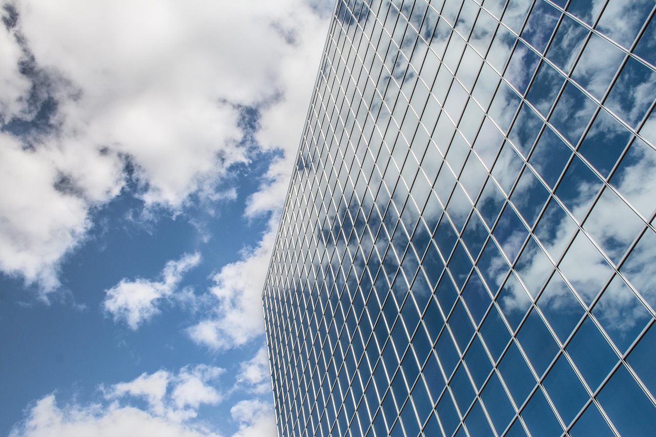 Building, reflection, clouds — "Why Organic Men's Underwear is the Smart Choice for Comfort, Health, and Sustainability"